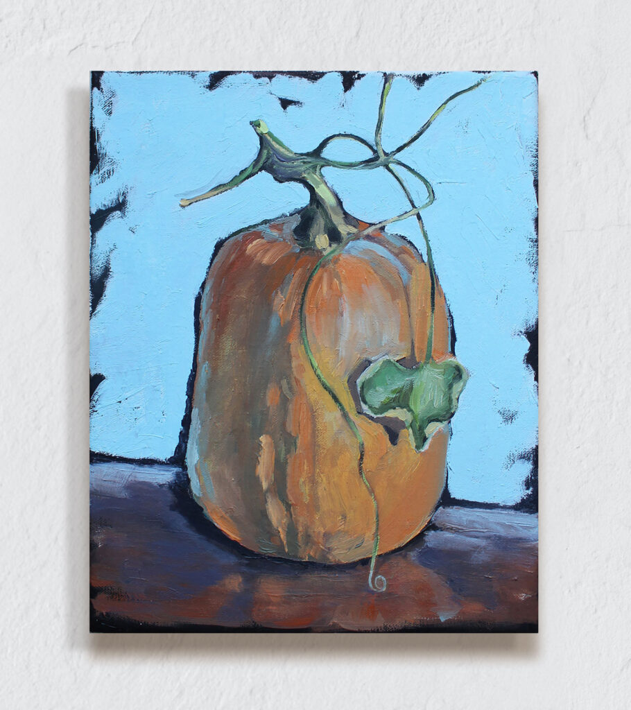 Butternut squash with leaf and vines. Bright blue background.