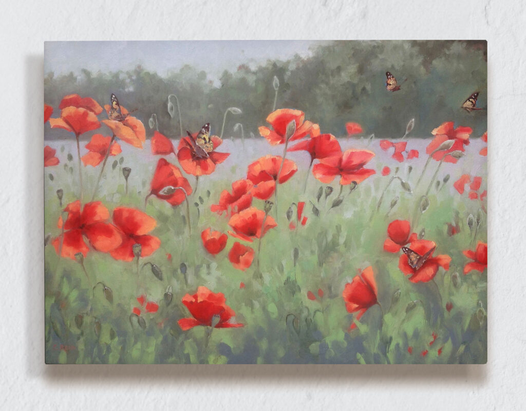 Field of poppies with painted ladies scattered throughout